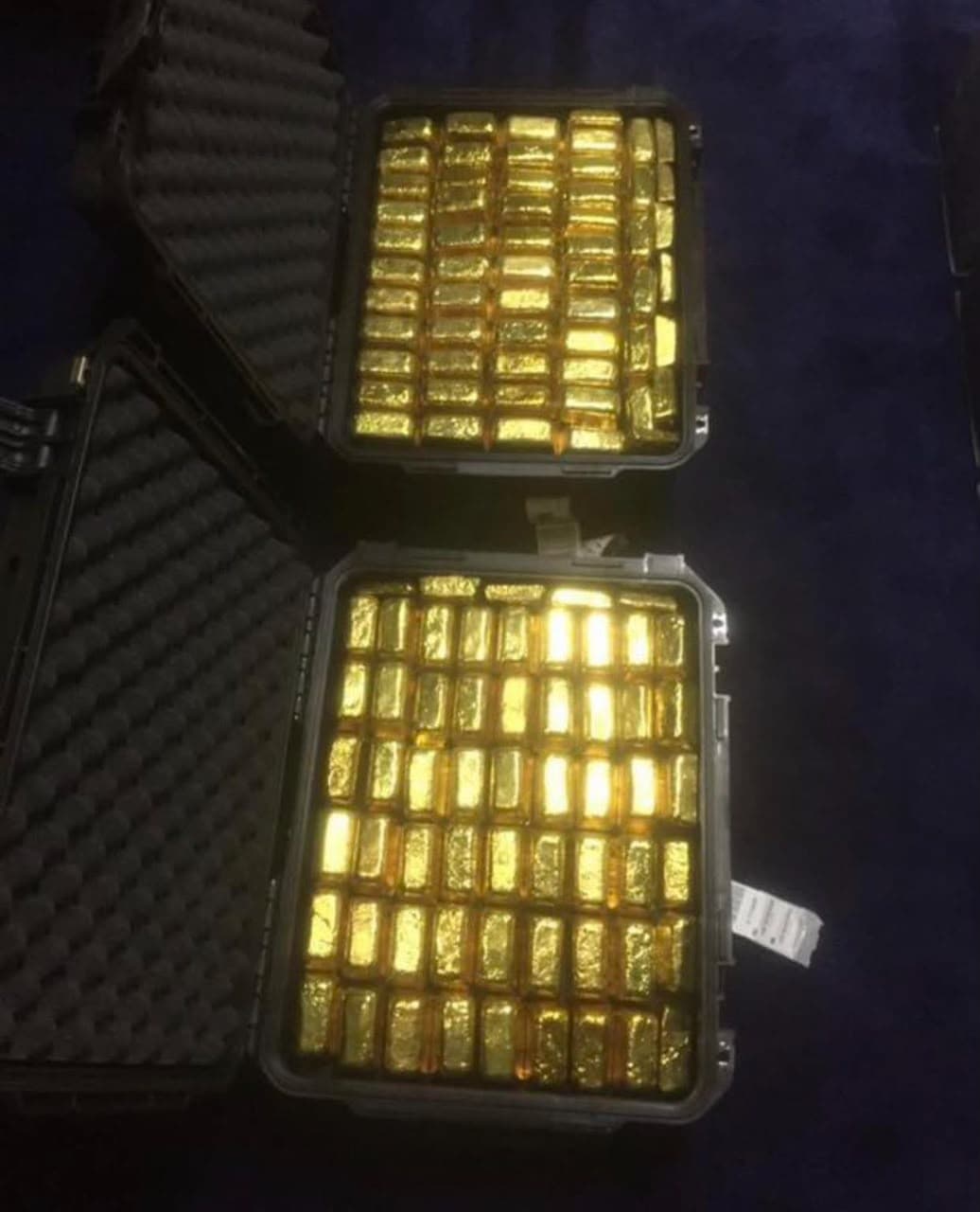 Refined gold bars held in secure cases